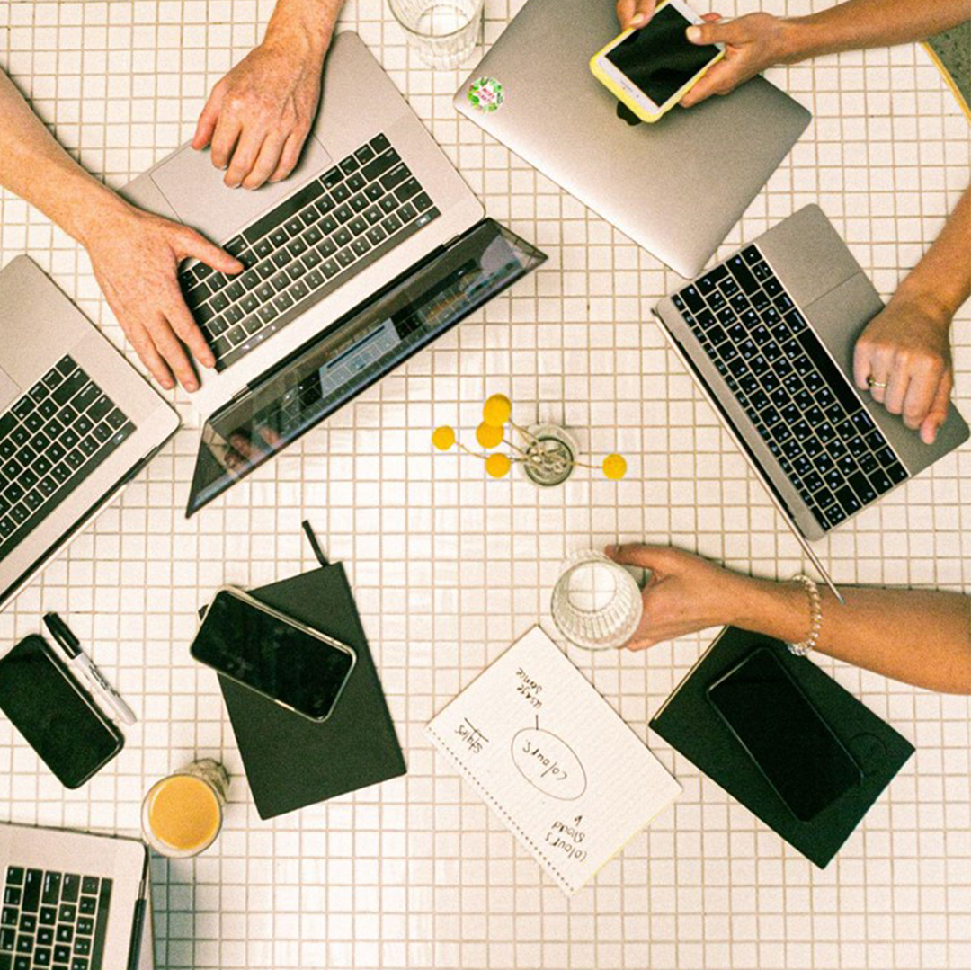 Marketing team working around a table